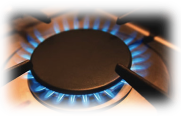 A Gas Stove Top Burner Turned On With A Link To One Stop Plumbing’s Gas Page