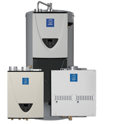 Group of silver commercial tankless water heaters with labels from State Water Heaters on the One Stop Plumbing water heater page